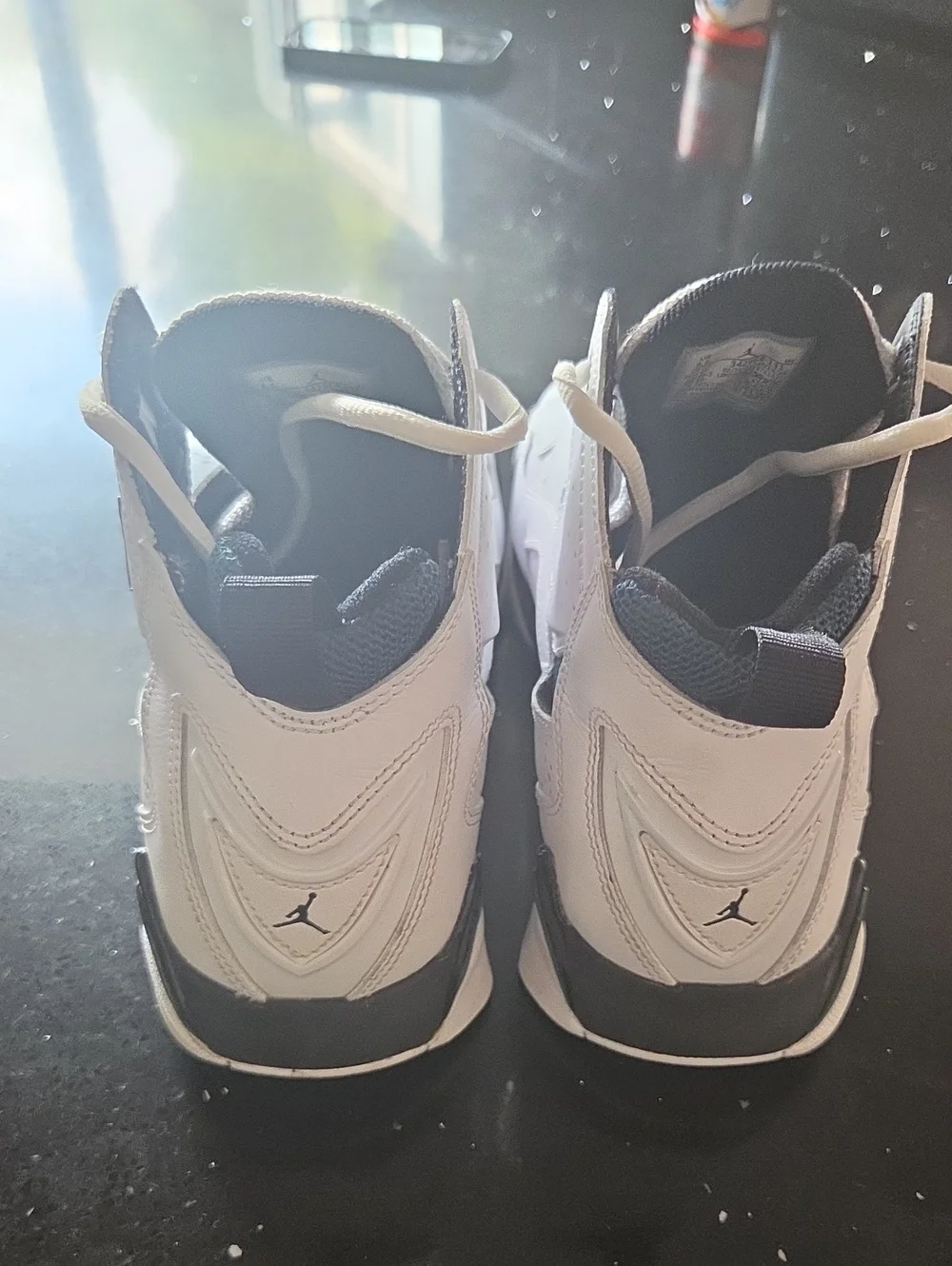 Jordan White and Teal High-Top Basketball Sneakers